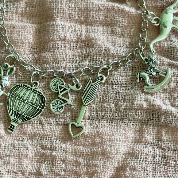 2/$9 Silver Charm Bracelet with Unique Pendants - Picture 5 of 6